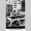 Man working at a drafting table (ddr-ajah-2-795)