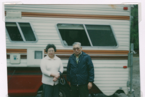 Mitzi and Takeo Isoshima with a camper (ddr-densho-477-490)