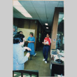 Group standing in office (ddr-densho-426-1195)