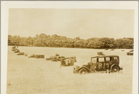 Cars in a field (ddr-njpa-13-260)