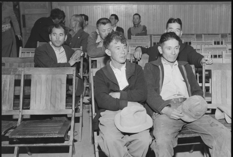 Japanese Americans waiting to register for mass removal (ddr-densho-151-239)
