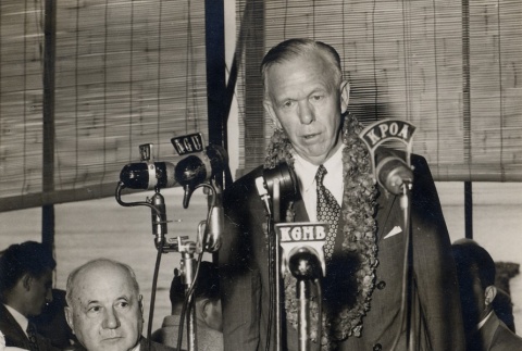 Ingram Stainback seated next to man speaking into microphones (ddr-njpa-2-1194)