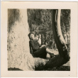 Tomoye (Nozawa) Takahashi sitting in a tree (ddr-densho-426-2099)