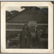 Woman standing by army jeep in front of Mess Hall (ddr-densho-466-5)