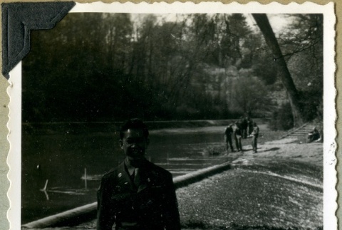 Soldier on the banks of a river (ddr-densho-22-80)
