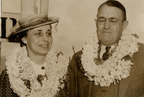 Lawrence M. Judd and a woman wearing leis (ddr-njpa-2-480)
