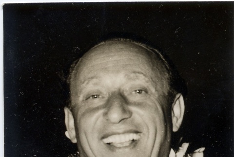 A man wearing leis (ddr-njpa-1-1160)