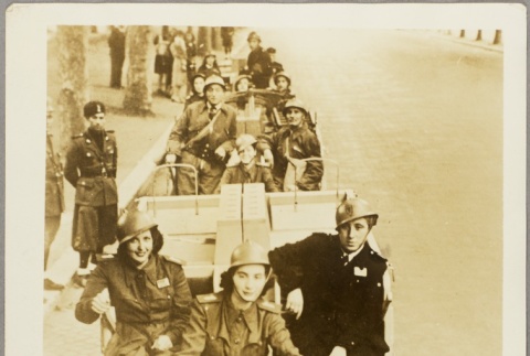 Men and women riding in motorcycle taxis (ddr-njpa-13-695)