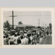 Crowd watching buses depart (ddr-densho-37-1439)