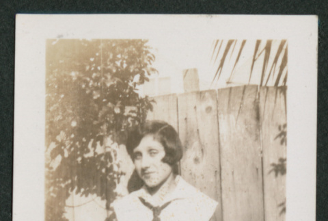 woman next to fence (ddr-densho-378-778)