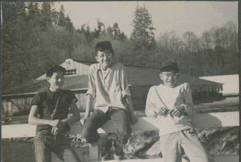 Three young men at Soo's Creek Hatchery (ddr-densho-201-1000)