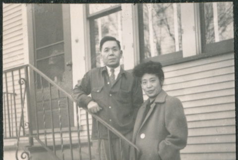 Couple on steps of house (ddr-densho-523-197)