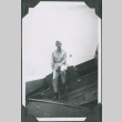 Man sitting in boat (ddr-ajah-2-667)