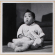 Susan Shiomi with stuffed toy (ddr-densho-522-173)