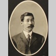 Portrait of Nikkei man in a suit (ddr-densho-259-437)