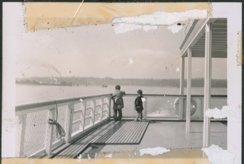 Two children on ferry deck (ddr-densho-483-1072)