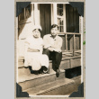 Mr. and Mrs. Yonemura sitting on front porch (ddr-densho-383-277)