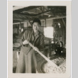 Tomoye Takahashi stirring vat of paper pulp (ddr-densho-426-1079)