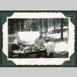 Two men at picnic table (ddr-densho-475-664)