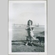 A toddler holding a cat (ddr-densho-300-70)