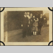 Family picture with three men, one woman and two children (ddr-densho-423-496)