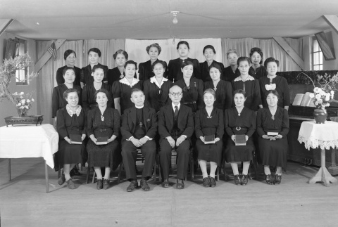Group photograph inside a camp church (ddr-fom-1-83)