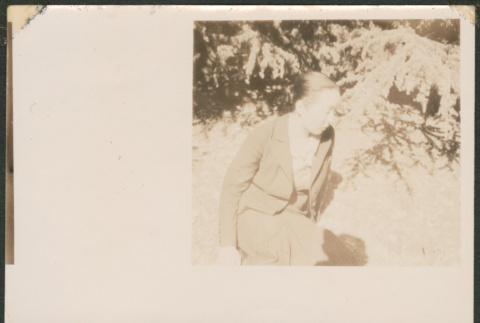 Woman sitting by greenery (ddr-densho-433-794)