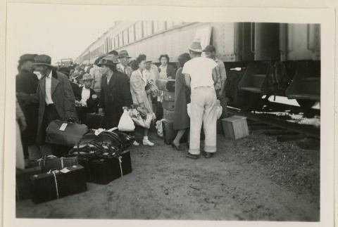 Crowd boarding a train (ddr-densho-37-912)