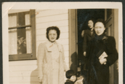 Three women and child on steps (ddr-densho-316-391)