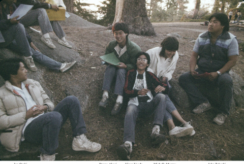 Campers resting on a hike up the mountain (ddr-densho-336-1651)