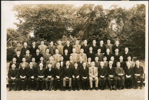 Group photograph in front of a wooded area (ddr-densho-395-20)