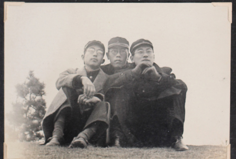 Joe, Shinji S., Sukekazu Kikuto gazing at the athletic field (ddr-densho-468-453)