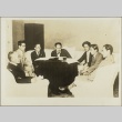 Men sitting around a small table (ddr-njpa-13-1444)