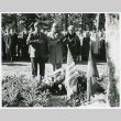 Three standing at memorial service (ddr-densho-1007-268)