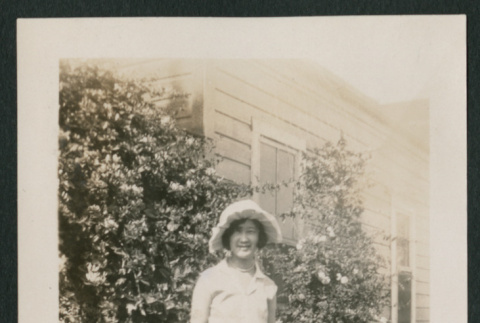 girl outside house (ddr-densho-378-455)