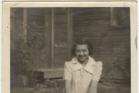 Rose Yamada with a dog (ddr-densho-432-94)