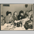 Dinner party, women wearing corsages (ddr-densho-522-757)