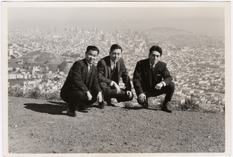 Three men on hill overlooking San Francisco (ddr-densho-426-82)