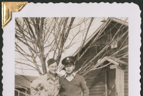 Two men in snow outside barracks (ddr-densho-434-346)