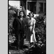 Tomoyuki Nozawa and Martha (Nozawa) Tsuchida Suzuki standing in garden (ddr-densho-426-2185)