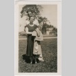 A couple standing in the grass (ddr-densho-313-41)