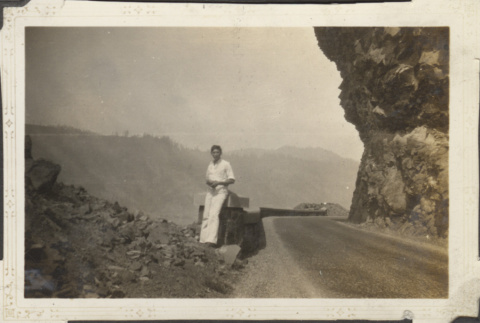 Man standing alongside road (ddr-densho-326-401)