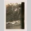 Man feeding ducks (ddr-densho-426-2102)