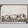 Group with bike in baseball uniforms (ddr-densho-326-239)