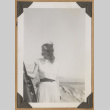 Woman on a cliff side (ddr-densho-542-88)