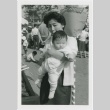 A woman holding a baby (ddr-densho-338-8)