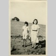 Mother and daughter on the beach (ddr-densho-113-53)