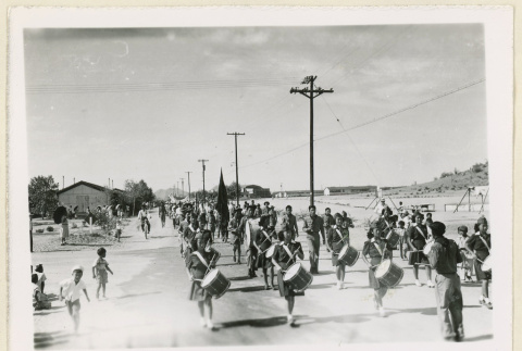 Girl and Boy Scouts at July 4th parade (ddr-densho-37-1601)