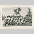 News Courier staff poses for a photo (ddr-densho-37-1544)