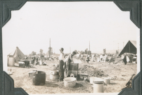 Men with tubs and other gear (ddr-ajah-2-265)